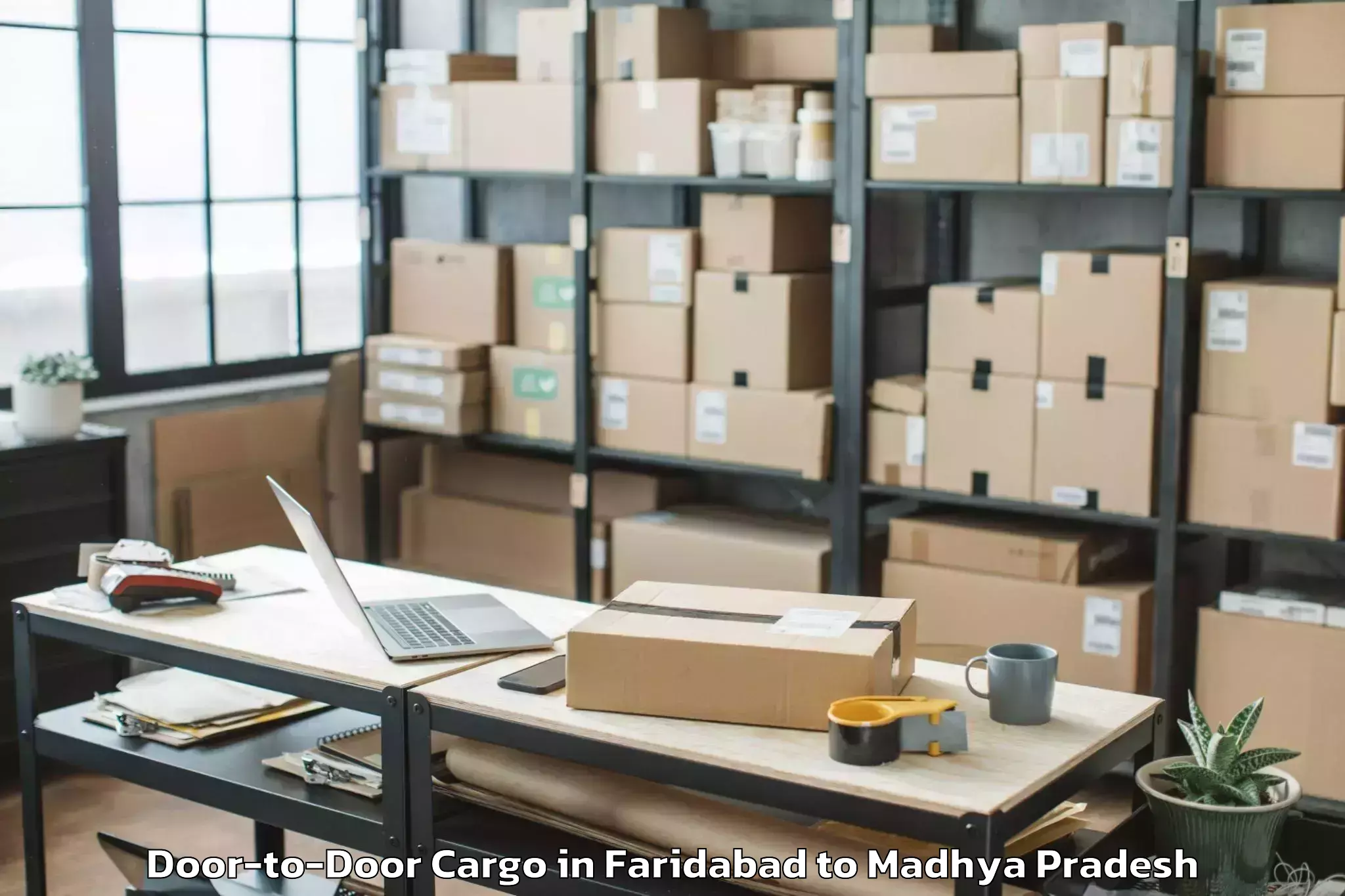 Book Faridabad to Guna Airport Gux Door To Door Cargo Online